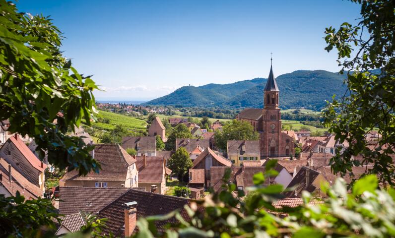 Old facades and narrow streets of Plombières-les-Bains in the Vosges