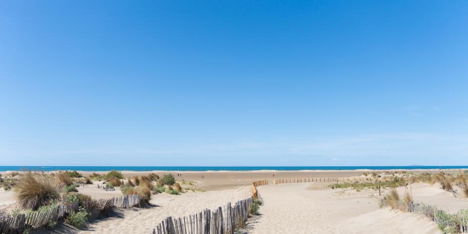 Wild Espiguette beach with dunes and Mediterranean horizon